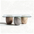 Salontafel met glazen blad en ovale stenen poten in natuurlijke kleuren 120 x 60 x 45cm