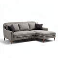 L-vormige grijze fauteuil met zachte stof en houten poten 200 x 90 x 85cm
